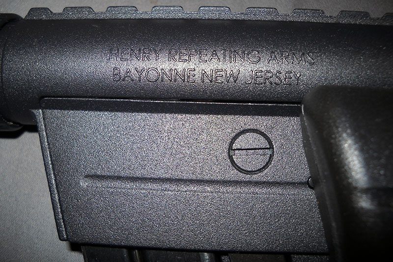 detail, AR-7 left side with marking: HENRY REPEATING ARMS  BAYONNE NEW JERSEY